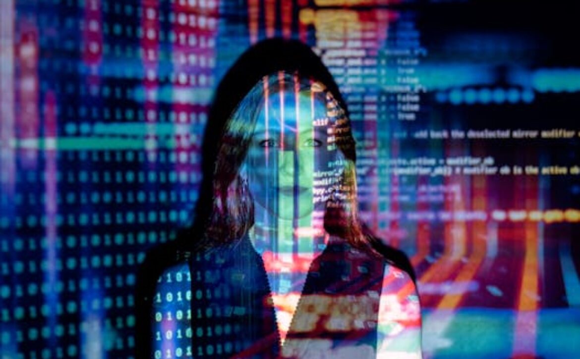 A woman with digital code projections on her face, representing technology and future concepts.